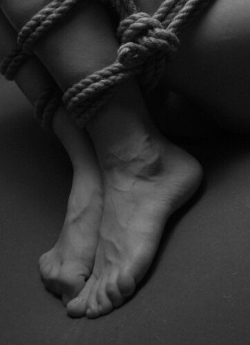 submissive woman bound as punishment